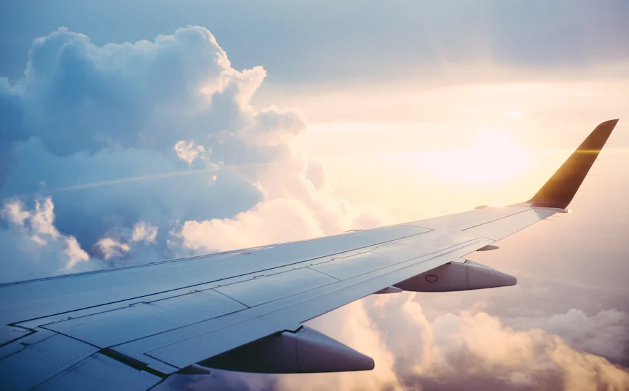Passenger aircraft flying above the clouds